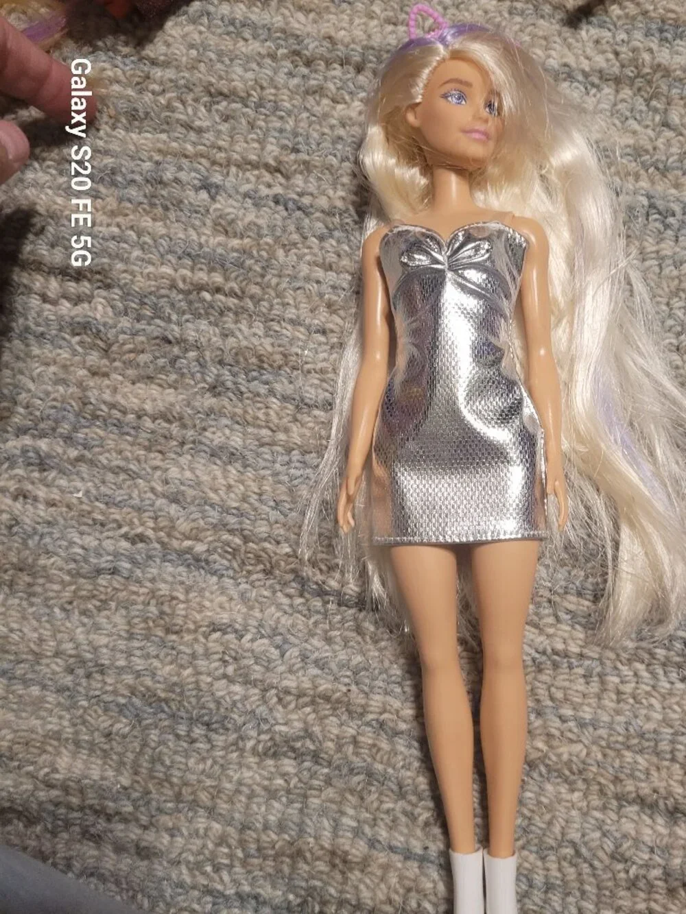Four Barbie Dolls